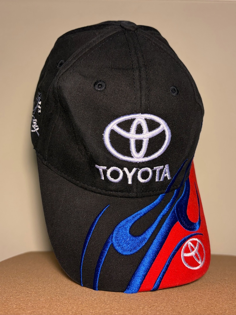 Toyota Racing Men’s Black Cap with Blue and Red Flame Accent